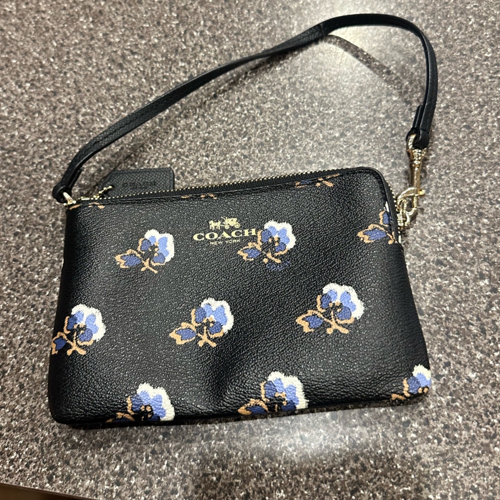 COACH Black Floral Wristlet with Blue and Tan Accents